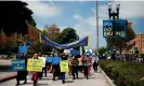  ?? Photograph: Jae C Hong /AP ?? UCLA faculty and staff members march on the school campus in Los Angeles, on 9 May 2024.