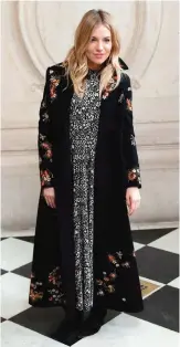  ??  ?? British US actress Sienna Miller poses during the photocall before the Christian Dior women’s Fall-Winter ready-towear collection fashion show in Paris.