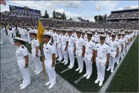  ?? TERRANCE WILLIAMS — THE ASSOCIATED PRESS ?? The Brigade of Midshipmen stand at attention during the National Anthem before an NCAA college football game between Navy and Air Force, Saturday, Sept. 11, 2021, in Annapolis, Md.