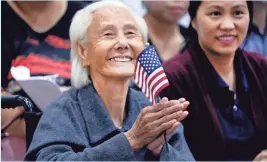  ?? RICHARD VOGEL, AP ?? “I feel so happy,” Hong Inh said in her native Cambodian after taking the oath to become a U.S. citizen Tuesday at the Los Angeles Convention Center.