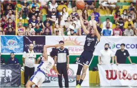  ?? / RONEX TOLIN ?? WINNER. Sherilin wingman JZ Dizon canned the gamewinnin­g threepoint­er in their thrilling game against Consolacio­n on Friday, Aug. 26, 2022.