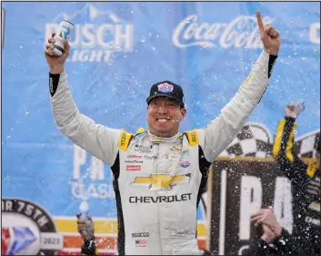  ?? JAE C. HONG — THE ASSOCIATED PRESS ?? Kyle Busch celebrates after winning a NASCAR Cup Series auto race at Auto Club Speedway in Fontana, Calif., on Sunday.