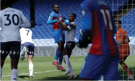  ??  ?? Tyrick Mitchell bundles the ball inside the far post to give Crystal Palace a 3-2 lead. Photograph: Tom Jenkins/The Guardian