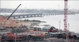  ?? PHOTO: REUTERS ?? The third bridge across Abidjan’s Ébrié lagoon is on schedule for completion in December. It could cut commuting time in Ivory Coast’s commercial capital from two hours to three minutes.