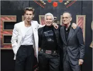  ?? INVISION/AP ?? Austin Butler, left, director Baz Luhrmann, center, and Tom Hanks pose for photograph­ers upon arrival for the premiere of the film ‘Elvis’ in London on May 31.
