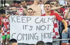  ??  ?? Taunted: Croatia fans poke fun at World Cup semifinals losers England following the Balkan country’s victory. Photo: Christian Charisius/dpa