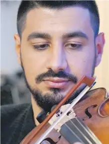  ?? SUBMITTED ?? Syrian refugee Sari Alesh is a 31-year-old violinist who will be performing Saturday in Central Saanich.