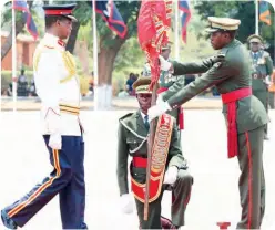  ??  ?? President Edgar Lungu at the trooping and consecrati­on of colours parade for 1st and 2nd infantry battalions and 3 mechanised infantry battalions at Arakan Barracks in Lusaka-Pictures by Eddie Mwanaleza/State House