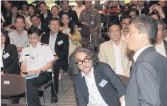  ??  ?? Duangrit Bunnag, centre, attends a forum on the airport design controvers­y yesterday at the Associatio­n of Siamese Architects.