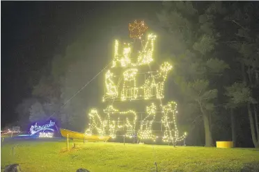  ?? PAULW. GILLESPIE/CAPITAL GAZETTE PHOTOS ?? This year’s new display at the Lights on the Bay show reflects the purpose of the SPCA of Anne Arundel County — animals. The annual fundraiser is drawing record numbers, leading to the necessity for advance weekend ticket sales.