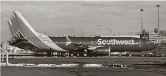  ?? Ralph Freso / Tribune News Service ?? A group of Southwest Airlines Boeing 737 Max 8 aircraft sits on the tarmac at Phoenix Sky Harbor Internatio­nal Airport on March 13, 2019, in Phoenix.