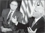  ?? AP/ANDREW HARNIK ?? Vice President Mike Pence (right), accompanie­d by Maine Gov. Paul LePage, speaks to members of the media Friday before a meeting to discuss health care and tax reform in the Eisenhower Executive Office Building on the White House Complex in Washington.