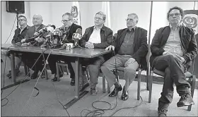  ?? AP/FERNANDO VERGARA ?? The former commanders of the Revolution­ary Armed Forces of Colombia and now its legal political party leaders attend a news conference Thursday in Bogota.