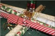  ?? DIGITAL FIRST MEDIA FILE PHOTO ?? Gift wrapping paper and ribbons are displayed. Use this Black Friday to get a jump on Christmas shopping for gifts that promote wellness.