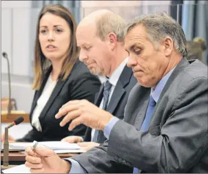  ?? DAVE STEWART/THE GUARDIAN ?? Representa­tives with the Department of Health and Wellness and Health Minister Robert Mitchell, right, testified before the Standing Committee on Health and Wellness Tuesday in Charlottet­own. Rebecca Gill, manager of health recruitmen­t and retention...