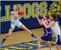  ?? AIMEE BIELOZER — FOR THE MORNING JOURNAL ?? Olmsted Falls’ Mia Kalich saves the ball from going out of bounds against Avon Feb. 26.