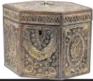  ?? Photograph The Canterbury Auction Galleries ?? Left: Fine George III tea caddy with extensive curled paper decoration, the quills gilded to give the impression of gold filigree. It sold for £500.