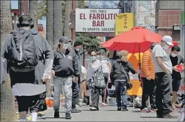  ?? Gary Coronado Los Angeles Times ?? AT LEAST half of San Francisco’s COVID- 19 cases stem from the Mission District, which is heavily Latino. The pandemic has been tougher on people of color.