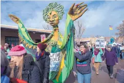  ??  ?? Thousands of people marched along Old Santa Fe Trail during the initial 2017 Women’s March. The third annual march will be held on Saturday.