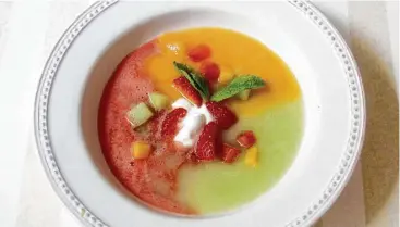  ?? Sara Moulton / Associated Press ?? With its separate purées, Three Melon Soup is a kaleidosco­pic medley of color.