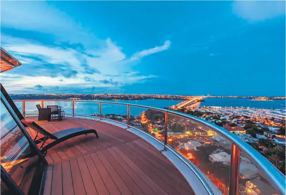  ??  ?? The two-level penthouse boasts 360-degree views of Auckland and comes with four decks.