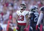  ?? PETER JONELEIT — THE ASSOCIATED PRESS ?? Tampa Bay wide receiver Mike Evans had six catches for 143yards and this touchdown last week in the Bucs' 20-6victory over the Titans.