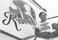  ?? DAVID TUCKER/USA TODAY NETWORK ?? Shy Morris is painting the Ruthy’s Kozy Kitchen logo in New Smyrna Beach, Fla., and other projects as weather permits.