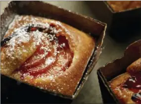  ?? PHIL MANSFIELD — THE CULINARY INSTITUTE OF AMERICA VIA AP ?? When making clafoutis , you can even use individual baking dishes for a sit-down dinner party.