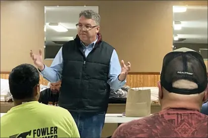  ?? THOMAS BEAUMONT — THE ASSOCIATED PRESS ?? Wisconsin U.S. House candidate Brad Pfaff, a Democrat, speaks at a labor union meeting in Bangor, Wis., Oct. 11, 2022. Pfaff is trying to make Republican Derrick Van Orden’s attendance at the protests in Washington, D.C., on Jan. 6, 2021, the defining issue in Wisconsin’s 3rd District race, though it is gaining little traction in the closing weeks of the campaign.