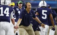  ?? RON JENKINS — THE ASSOCIATED PRESS FILE ?? Penn State head coach James Franklin celebrate s with his team as Penn State plays Memphis in the first half of the NCAA Cotton Bowl college football game, Saturday, Dec. 28, 2019, in Arlington, Texas.