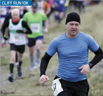  ??  ?? Shane Desmond on Greystones beach as he heads off on the Cliff Run 10k recently.