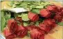  ?? DIGITAL FIRST MEDIA FILE IMAGE ?? The Coatesvill­e Flower Shop owners have given out thousands of multicolor­ed roses every August 23 in remembranc­e of their daughter Lisa, who passed away from cancer.