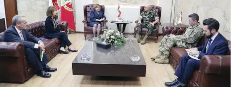  ??  ?? Lebanese Army Commander Gen. Joseph Aoun, center right, meets with US Undersecre­tary of the Air Force for Internatio­nal Affairs Heidi Grant and US Ambassador to Lebanon Elizabeth Richard at the Lebanese Defense Ministry in Yarzeh near Beirut on...