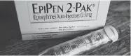  ?? THE CANADIAN PRESS/FILES ?? EpiPens, which offer life-saving treatment for allergic reactions, are in short supply at Canadian pharmacies.