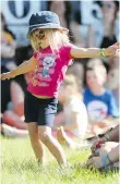  ??  ?? Alynne Michaud, 3, dances to a Fred Penner song at last year’s children’s festival.