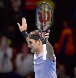  ??  ?? Roger Federer celebrates his 6- 7 ( 5/ 7), 6- 4, 6- 1 victory over Croatia’s Marin Cilic in their mens singles match of the ATP World Tour Finals at the O2 Arena in London on Thursday. —