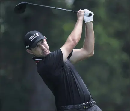 ?? JULIO CORTEZ — THE ASSOCIATED PRESS ?? Patrick Cantlay tees off during his victory in the BMW Championsh­ip on Sunday. Cantlay prevailed in a six-hole playoff.