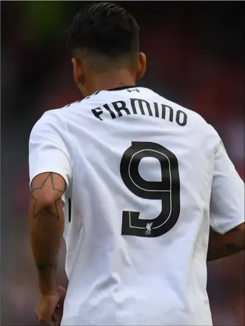  ??  ?? A Roberto Firmino strike earned Liverpool a dramatic win over Paris Saint Germain.