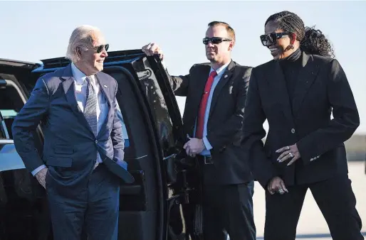  ?? AFP ?? Joe Biden y Michelle Obama antes de subir al Air Force One