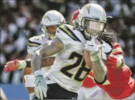  ?? Robert Gauthier Los Angeles Times ?? MELVIN GORDON finished with 1,581 yards from scrimmage last season. The Chargers want to see more of that but could look to draft another running back.