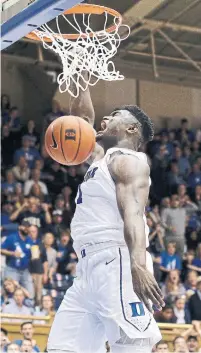  ?? GERRY BROOME THE ASSOCIATED PRESS ?? NCAA basketball star Zion Williamson had received scholarshi­p offers to play college football before joining Duke’s roster.
