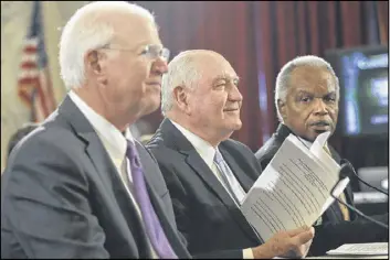  ?? PABLO MARTINEZ MONSIVAIS / AP ?? Agricultur­e Secretaryd­esignate, former Georgia Gov. Sonny Perdue (center), accompanie­d by former Georgia Sen. Saxby Chambliss, R-Ga., (left) and Rep. David Scott, D-Ga., prepares to testify at his confirmati­on hearing.