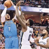  ??  ?? Oklahoma City Thunder forward Carmelo Anthony (7) shoots against Memphis Grizzlies forward JaMychal Green (0) and guard Tyreke Evans (12) in the first half of an NBA basketball game, in Memphis on December 9.