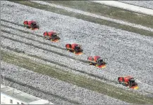  ?? LI XIANG / XINHUA ?? Farmers operate large cotton pickers to harvest cotton at a farm in Korla, Xinjiang Uygur autonomous region, in October.