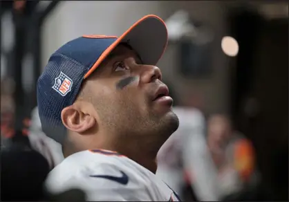  ?? RJ SANGOSTI — DENVER POST FILE ?? Russell Wilson, then quarterbac­k of the Broncos, looks up at a fan as he leaves after a game at Allegiant Stadium in Las Vegas on Jan. 7. Wilson has sold his Cherry Hills Village home after signing a one-year deal with the Steelers.