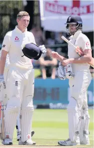  ??  ?? Warwickshi­re’s Dominic Sibley yesterday (right) batting for England with Zak Crawley