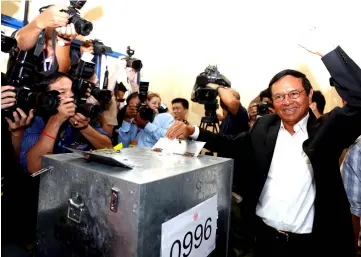  ?? — Reuters photo ?? File photo shows Kem Sokha casts his vote during local elections in Kandal province, Cambodia.