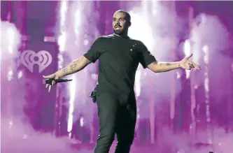  ?? CHRISTOPHE­R POLK/GETTY IMAGES ?? Drake performs onstage at the 2016 iHeartRadi­o Music Festival at T-Mobile Arena on Sept. 23, in Las Vegas. The rapper has released a short film based on his latest album, Views.