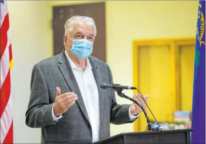  ?? Ellen Schmidt Las Vegas Review-journal @ellenschmi­dttt ?? Gov. Steve Sisolak gives an update on Nevada’s COVID-19 response efforts during a news conference Monday at the Sawyer Building. Among the updates was a 45-day extension of the state’s residentia­l eviction moratorium.