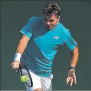  ?? GETTY IMAGES ?? Stan Wawrinka of Switzerlan­d plays a backhand during his match against Damir Dzumhur in Dubai on Tuesday.